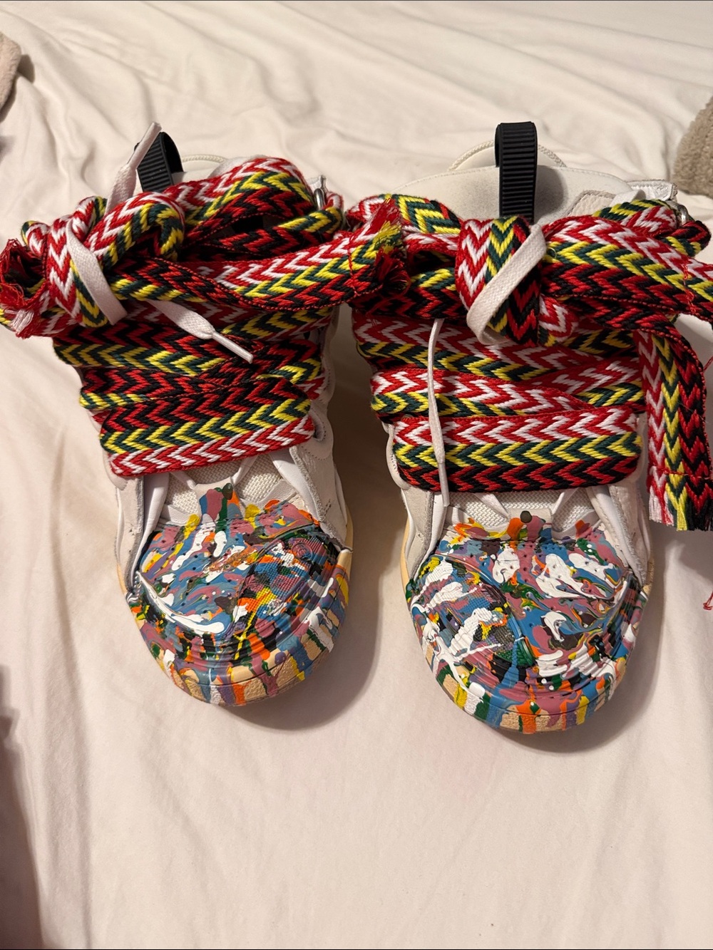 White Sneakers with Multicolor Paint-Splash Toe and Red-Yellow-Black Laces